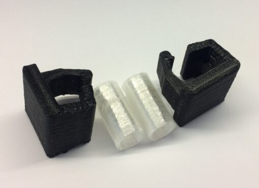 photo contenu du kit - deux butées plastique PLA et deux amortisseur TPU